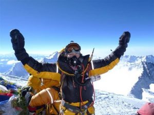 MANDY RAMSDEN AT THE TOP OF MOUNT EVEREST
(Photo from the HSZ talk "Climbing the Highest Mountain on each of the Seven Continents" by Mandy Ramsden).
