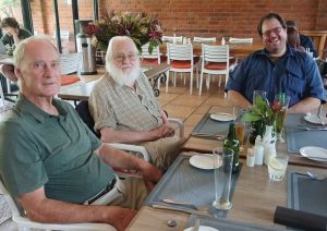 Charles Waghorn and Ray Roberts meet with Paul Hubbard before his talk